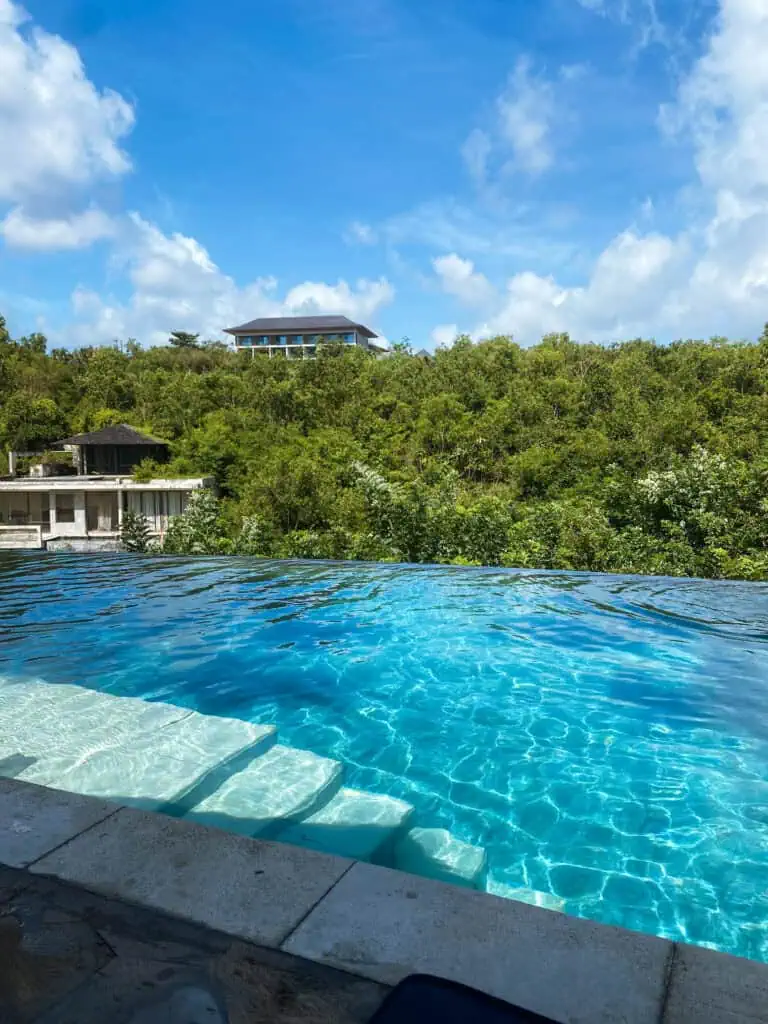 Pool side view at resort in Bali with sunny weather